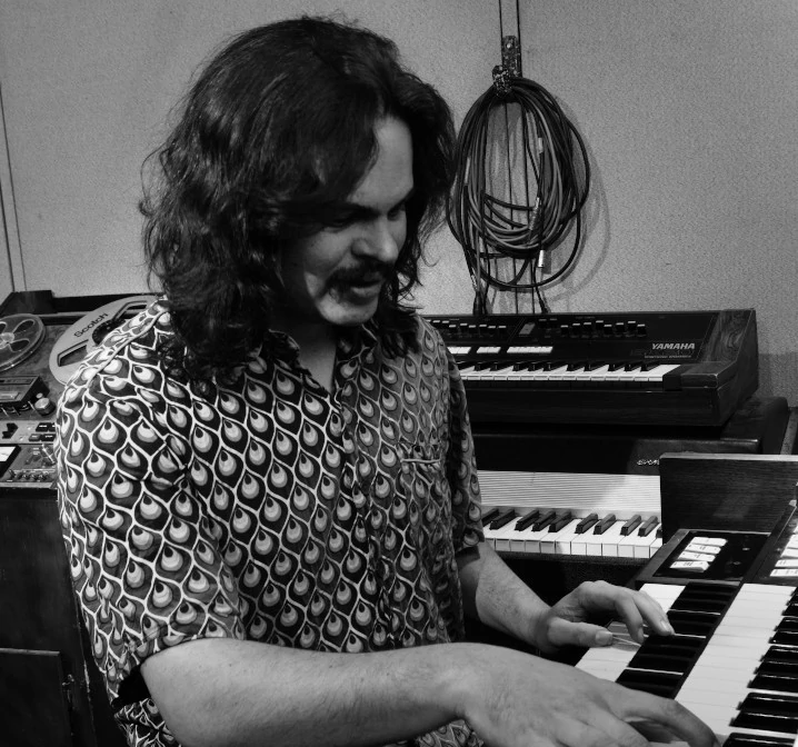 Jacob playing an organ